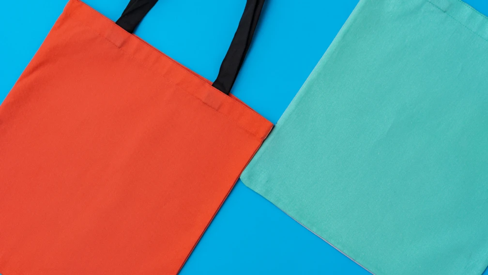 Engineering High-Capacity PP Nonwoven Reusable Bags for Enterprise Retail